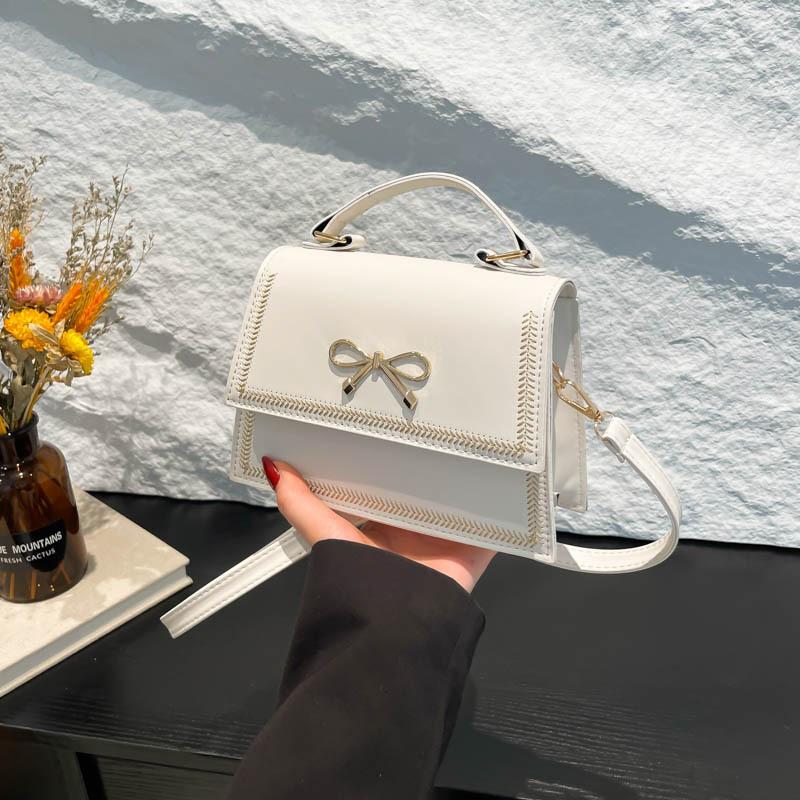 2025 summer new fashion large capacity simple casual texture solid color large capacity bow shoulder messenger bag
