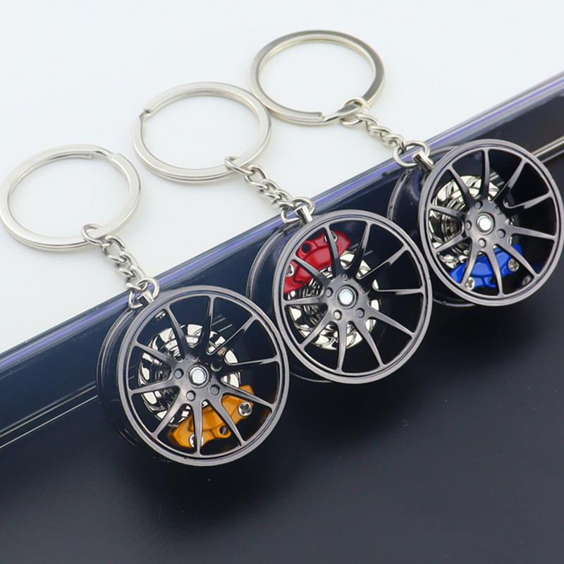 1PC Wheel Hub Car Key Chain Fidget Toy Car Tire Brake Disc Keychain Fingertip Gadget Keyring Bags Pendant 3D Alloy Model Gift