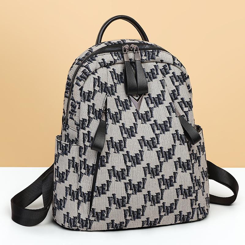 Autumn and winter new schoolbag backpack fashion travel lightweight junior high school high school canvas large capacity backpack