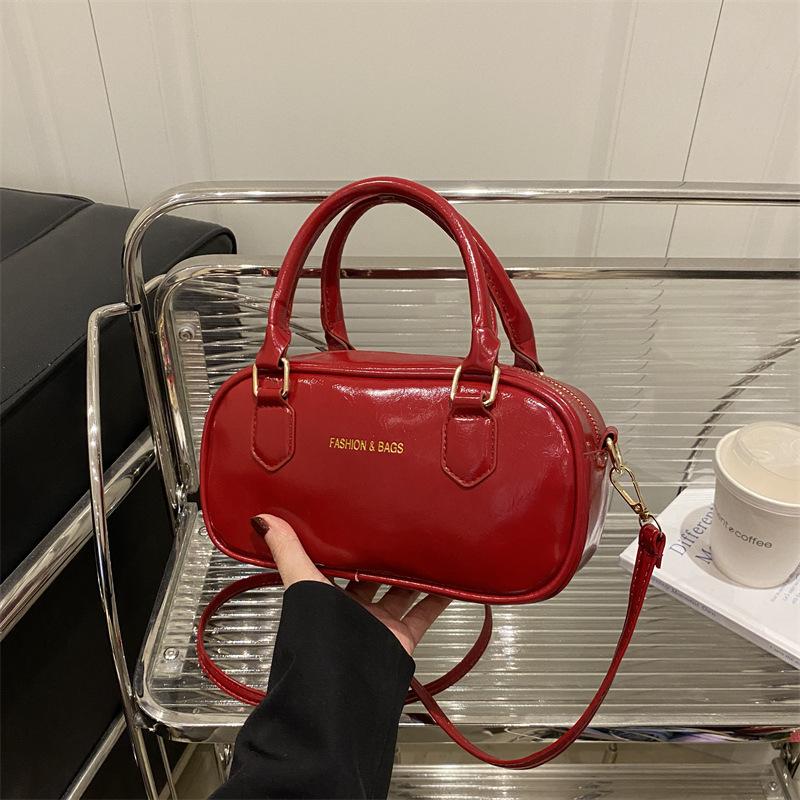 Portable New Bowling Bag Women's 2025 Spring and Summer New Korean Version Fashion Shoulder Bag Simple Casual High Texture