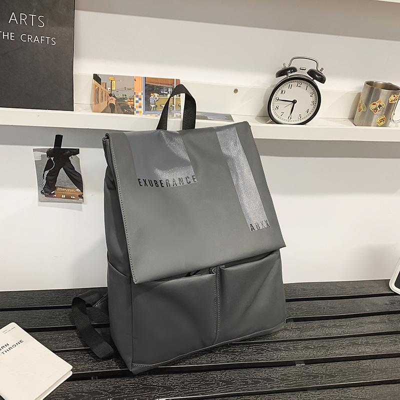 

College student schoolbag male high school student casual simple large capacity computetravel backpack female junior high school student backpack tide серый
