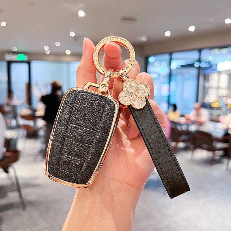 Toyota Key Cover for Camry, RAV4, Corolla, Levin, Avalon: Stylish Shell Buckle for Women.