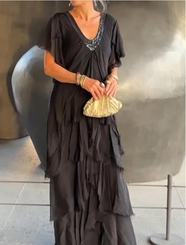 

Элегантное черное вечернее платье с V-образным вырезом, блестящей отделкой и юбкой с оборками S чёрный