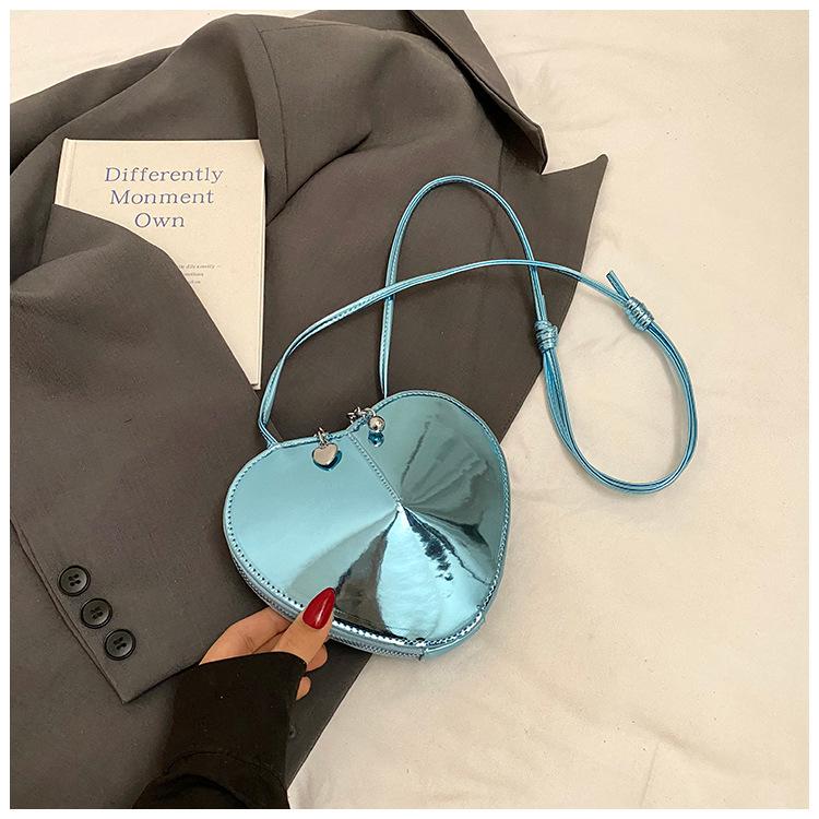 

Spring and summer popular niche love jelly bag 2025 new niche design messenger bag Korean version shoulder mobile phone bag синій