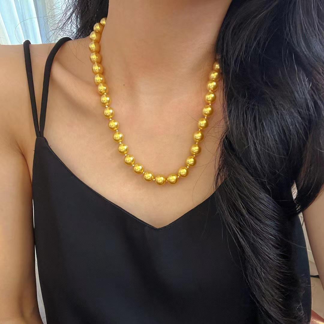 

Vintage High-Quality Artificial Shijia Nanyang Gold Beads Knotted Collarbone Chain Pearl Necklace Premium Ingot Buckle