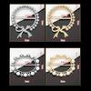 New Metal Knotted Buckle Ring T-shirt Pearl Knotted Button Clothing Accessories Removable Shawl Ring Clip Women