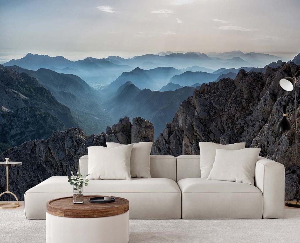 Wallpaper Mountain peak in the clouds