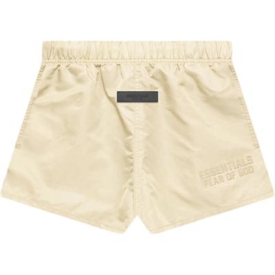 Fear of God Essentials Herbst/Winter 2022 Nylon Laufshorts Mit Gummi-Logo Unisex-Shorts Eierschalen-Weiß FOG-FW22-37