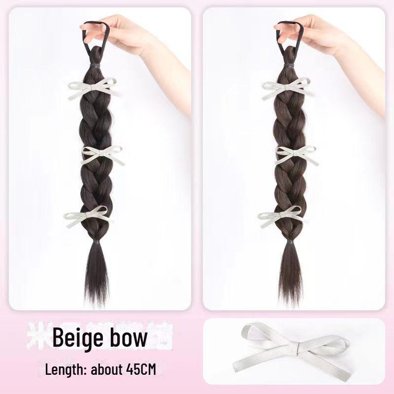 

Мила зачіска в стилі мультфільму: Балетні бантові коси із зав’язаною збоку риб’ячою кісткою та довгим хвостиком