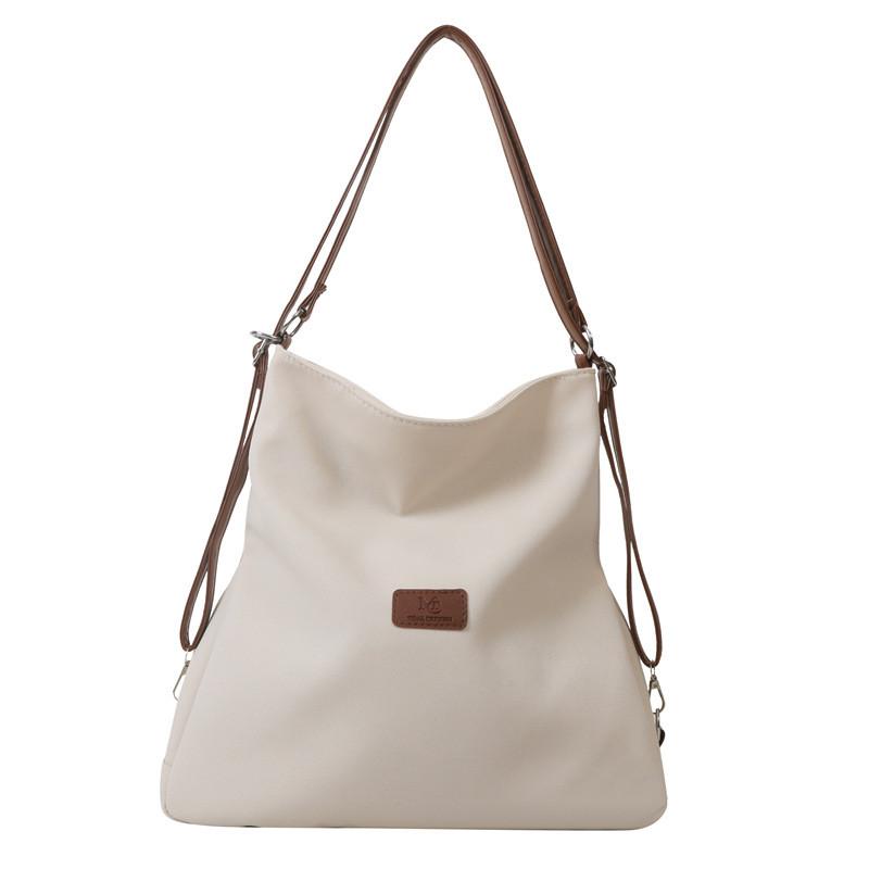 

Canvas Student Backpack For School With Spacious Design And Nylon Material For Daily Use слонова кістка