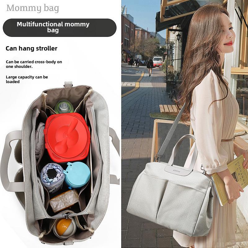 Modische multifunktionale Mamatasche: Isolierte Wickeltasche zum Tragen in der Hand, als Schultertasche oder als Messenger-Tasche für Mutter und Baby