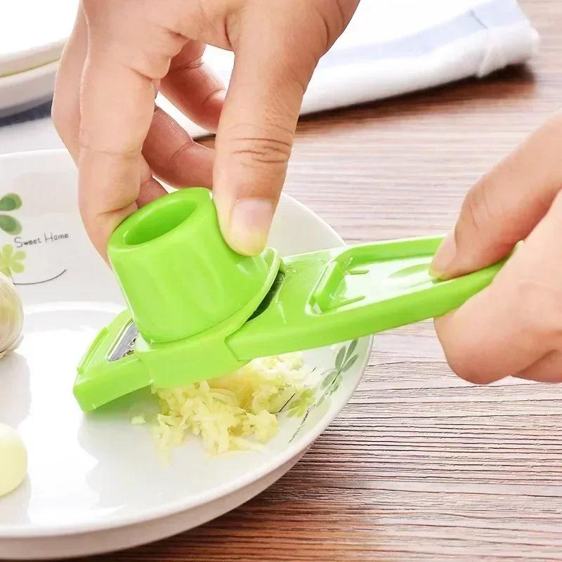 Drtič na zázvor a česnek, lis na mletí a struhadlo na česnek, řezačka, škrabka, ruční mlýnek na česnek, sekání česneku, kuchyňské příslušenství