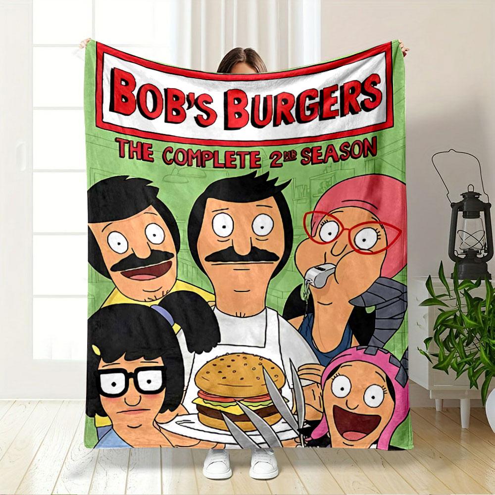 Cartoon characters gathered with a burger, some making humorous expressions. for all seasons blanket lunch break throw gift
