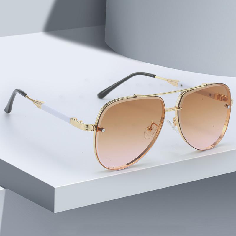 Latest in Sunglasses for Women Trendy Styley Gradient Lenses Golden Borders Red Temple Glass Minimalist Design Exudes Modernity