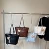 Sommer Neue Einfarbige PU Süße Elegante Leichte Luxus Tragetasche Modische und Einfache Pendel-Freizeit-Schultertaschen für Damen