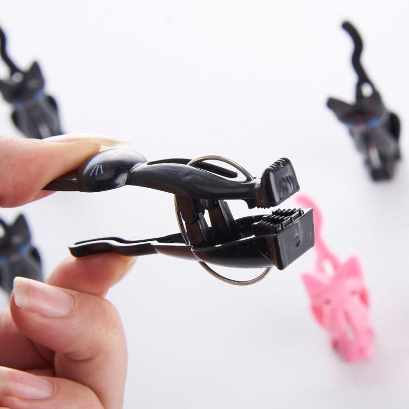 4 szt. Plastikowe klamerki do prania w kształcie kotów Klipsy do ubrań Kreskówkowe klipsy do ręczników plażowych Klips do pościeli skarpetek Wiatroszczelne klipsy do prania do domu