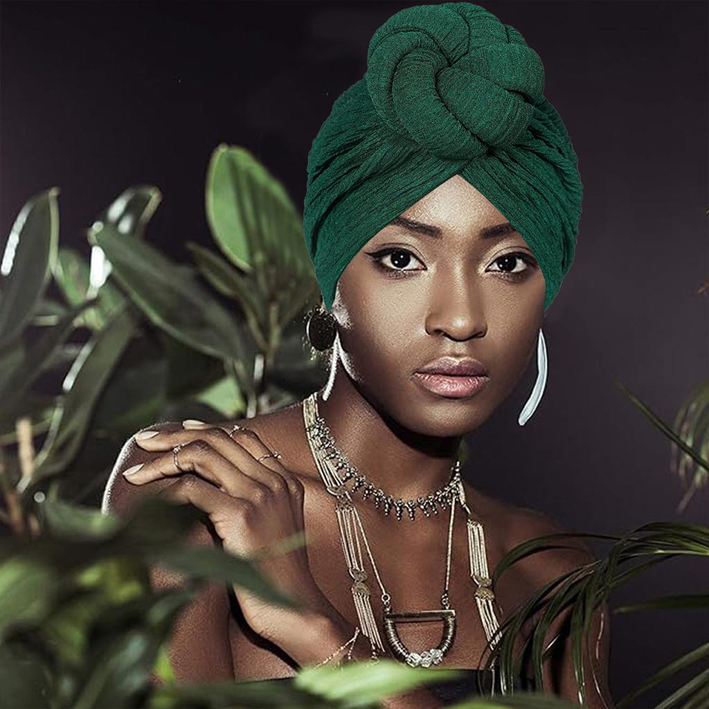 Africké módní uzlování, lehký luxus, přehnaný styl, ruční svatba, důležité příležitosti nošení šátků, klobouků a