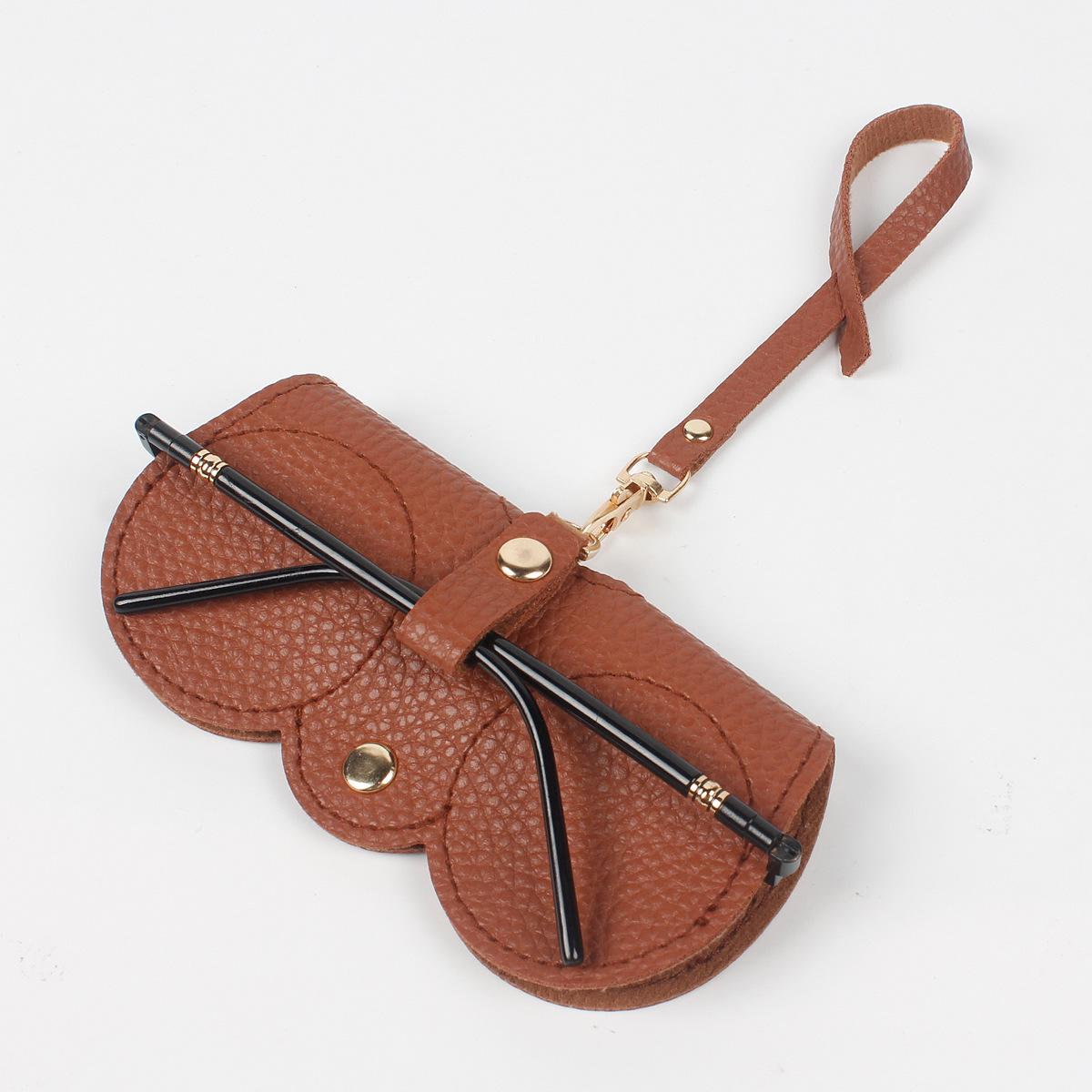 

Роскошная кожаная сумка для очков с возможностью подвешивания — портативное, нейтральное и высококачественное решение для хранения коричневый