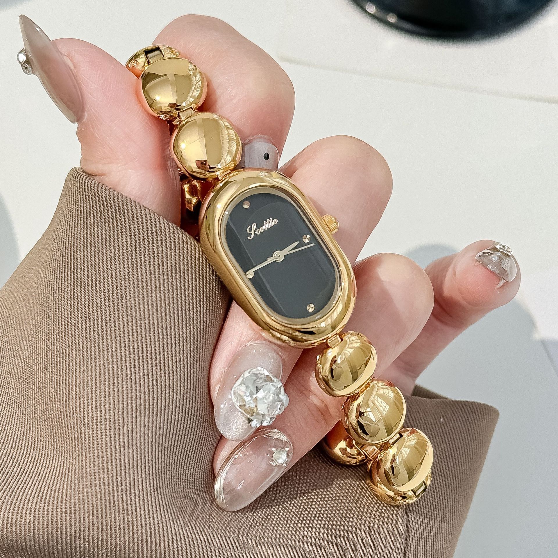 9731B High Value Gold Women S Watch Temperament Oval Watch Bracelet Women