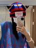 Wintermütze für Damen im koreanischen Stil mit gestrickten Katzenohren, Hip-Hop-Design und warmem Pullover mit Schriftzug, wie von Influencern getragen.