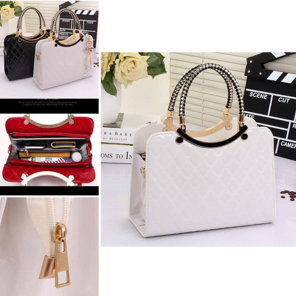Premium Quality Ladies Handbag With Ornament And Large Capacity Design