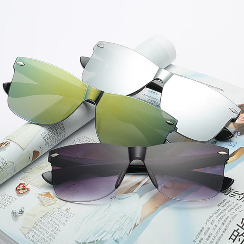 Nueva película de color reflectante de hombres y Mujeres Protección UV400 Espejo Sin Marco De Rana