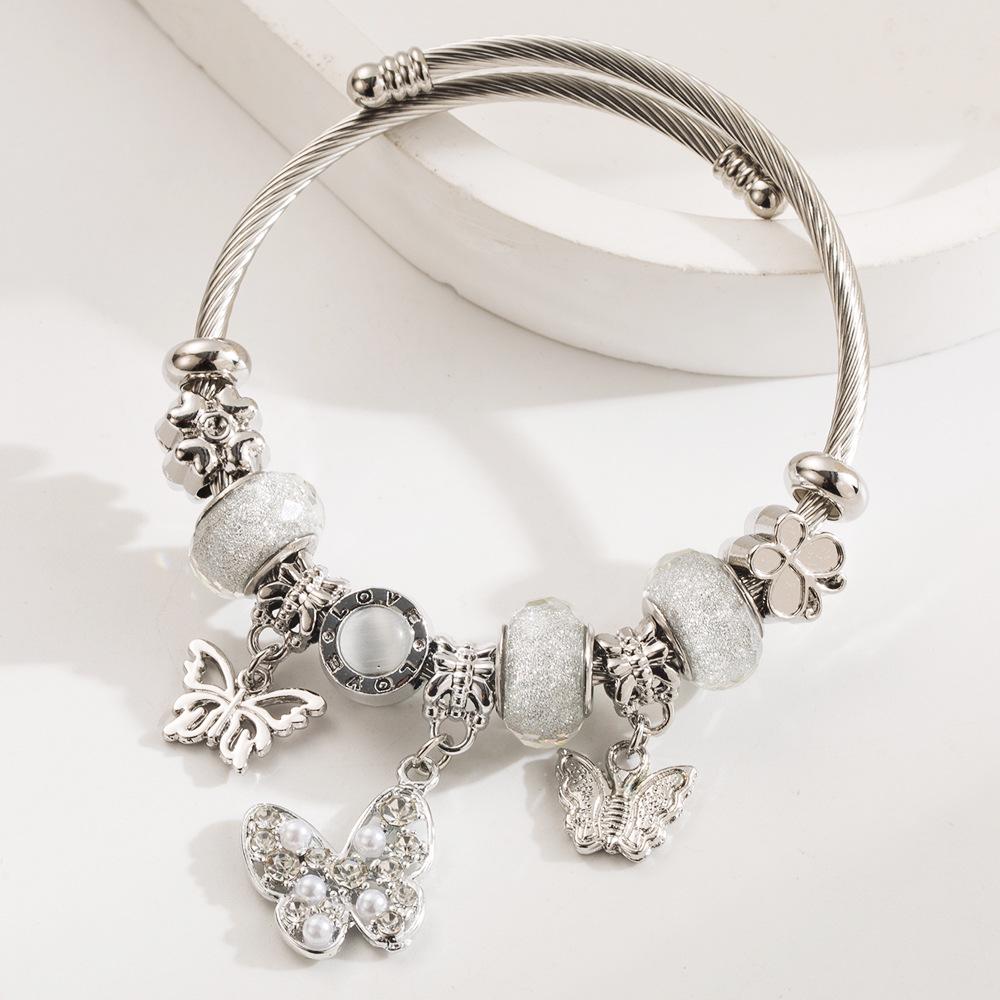 Panjia Dora Stainless Steel Bracelet: Women's Adjustable Bracelet with Diamond Beads & Love Pendant.
