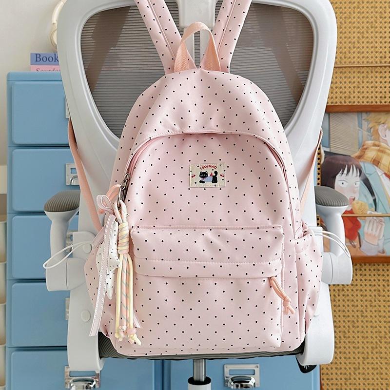 School bag: new elementary school backpack, girls' middle school students, high aesthetic value, INS style, niche, cute polka dot lightweight backpack