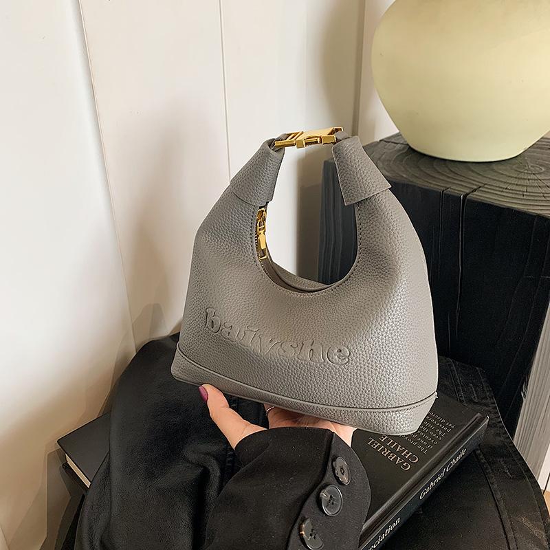 

2025 new Maillard hand carry women s bag commuter casual fashion retro trend shoulder messenger bag 20.5*10*21 серый