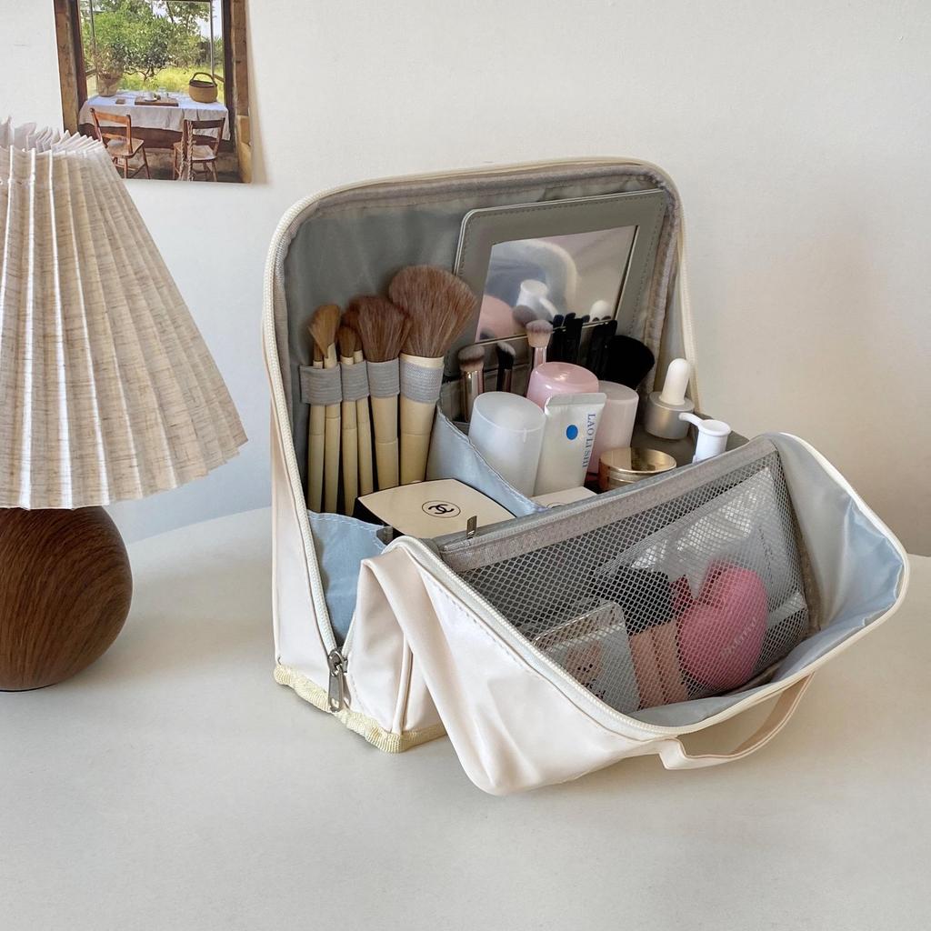 Portable Large Capacity Makeup Bag with Mirror, Hangable on Suitcase, Compartmentalized Cosmetic Storage Pouch.