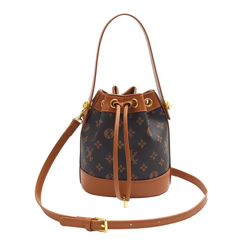 

Женские сумки с высококачественной текстурой, модные сумки-ведра нового стиля, модные сумки на одно плечо с принтом