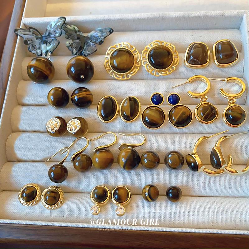 Silver Needle Tiger's Eye Style Earrings: Elegant, Fashionable Studs with Caramel Color Finish.