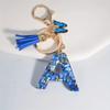 1pc Custom Blue Alphabet Letter Keychain with Butterfly Pendant Resin Ladies Key Ring with Tassel - Elegant Accessory for Bags Backpacks