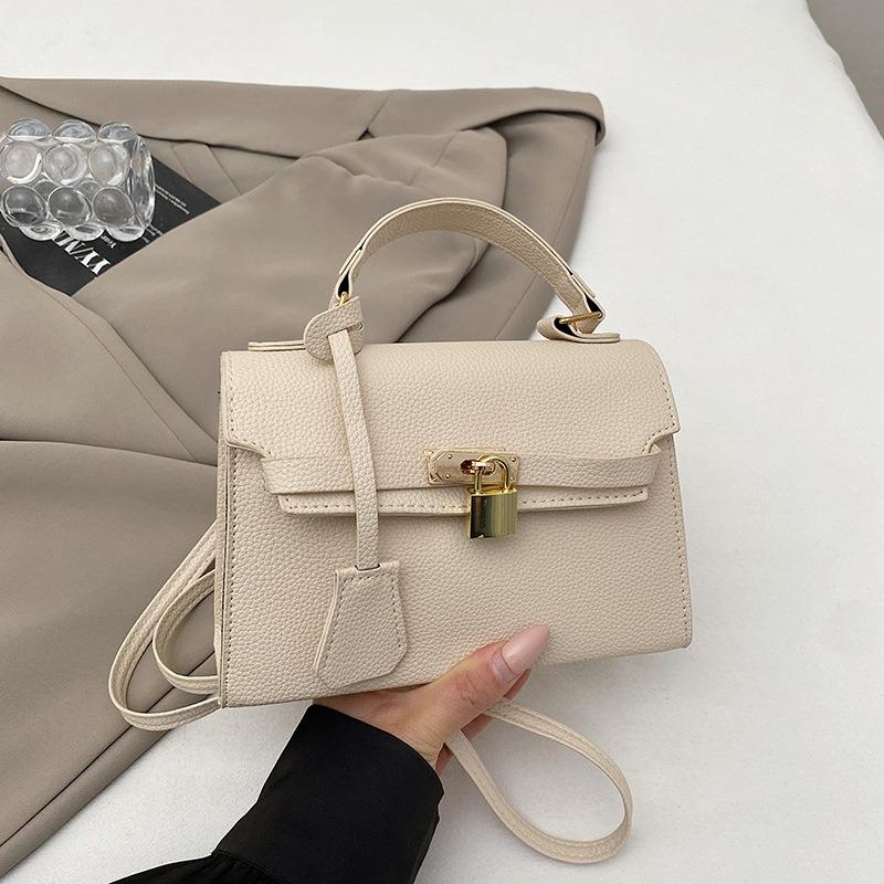 High-end women's handheld Kelly bag new trendy spring and summer bag fashion niche design crossbody bag