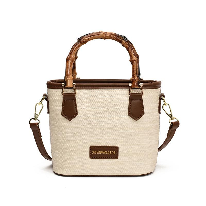 Handtasche, kleiner Eimerbeutel, Damen neu, schlicht und hochwertig, vielseitige Umhängetasche, Nischen-Umhängetasche aus Stroh