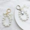 Stylish Bowknot Keychain Faux Pearls Bowtie Pendant for Women's Handbags and Backpacks Colorful Key Chain Bag Ornament