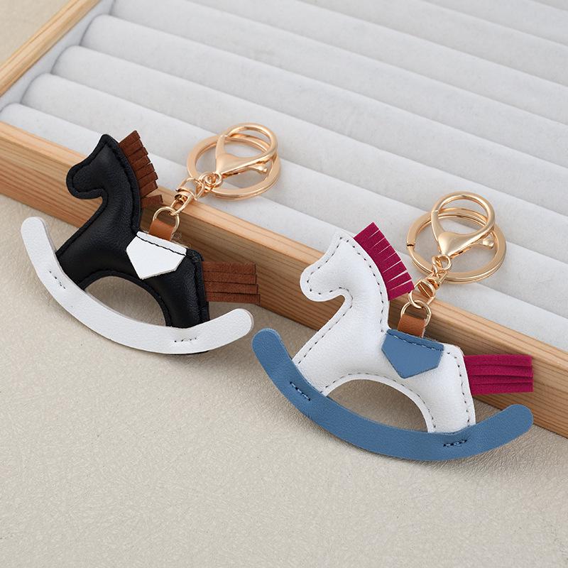 Innocent & Cute Rocking Horse Keychain: Creative Couple's Cartoon Cotton-Filled Decoration for Bags