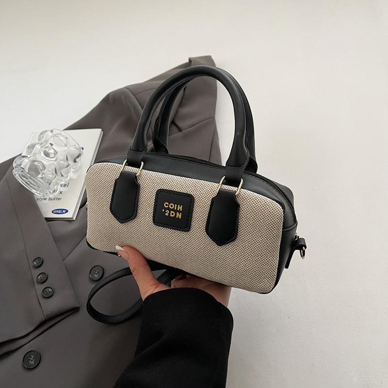 

Niche contrasting color bowling bag women s 2 new high-end canvas handbag retro shoulder messenger bag чёрный