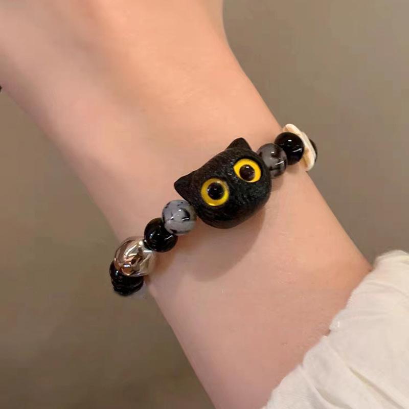 

Girl s Light Luxury Niche New Chinese Style Bracelet Yellow eye cat head