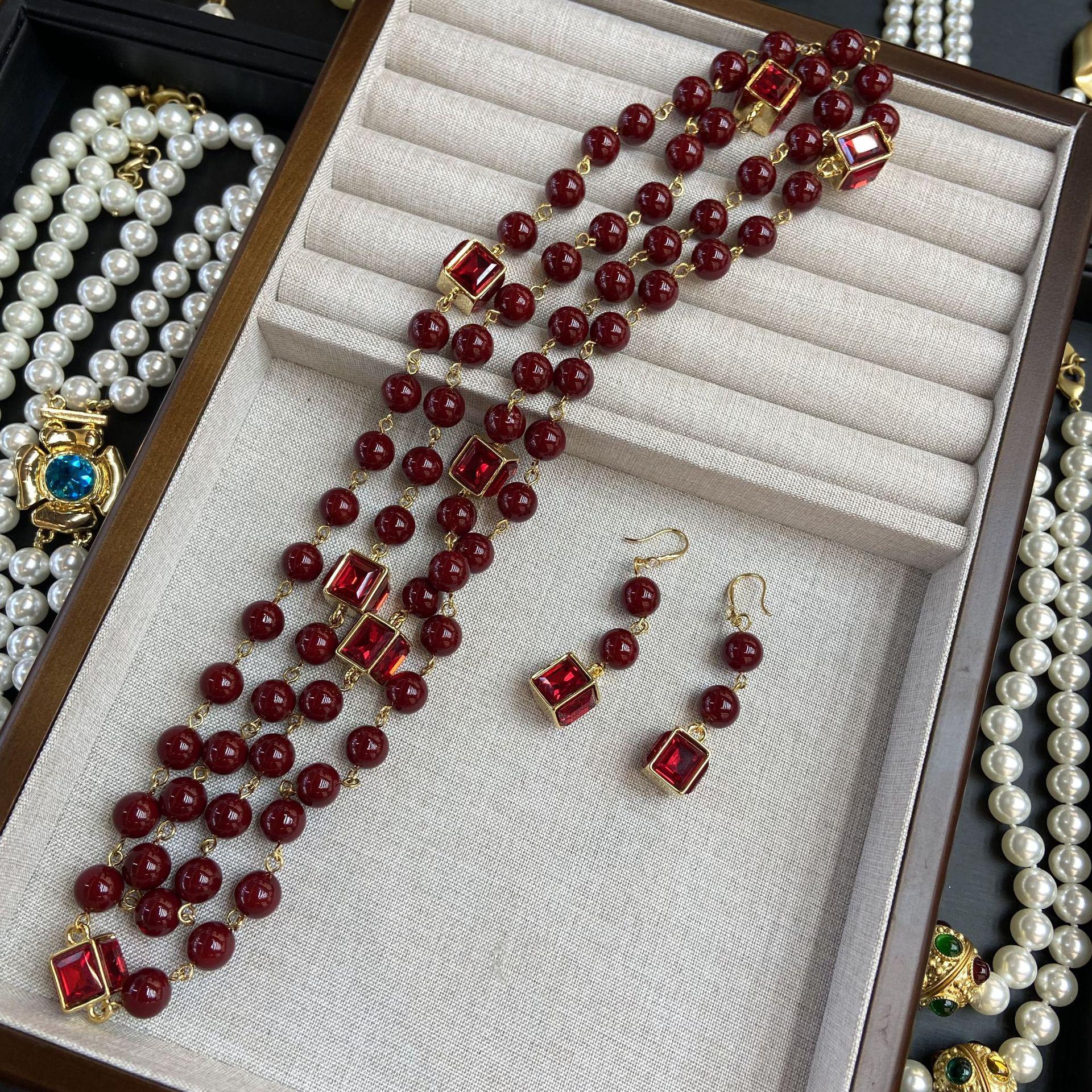 

Vintage Qingdao 10mm Shijia Pearl Long Necklace Sweater Chain with Red Zircon Ear Hook Set
