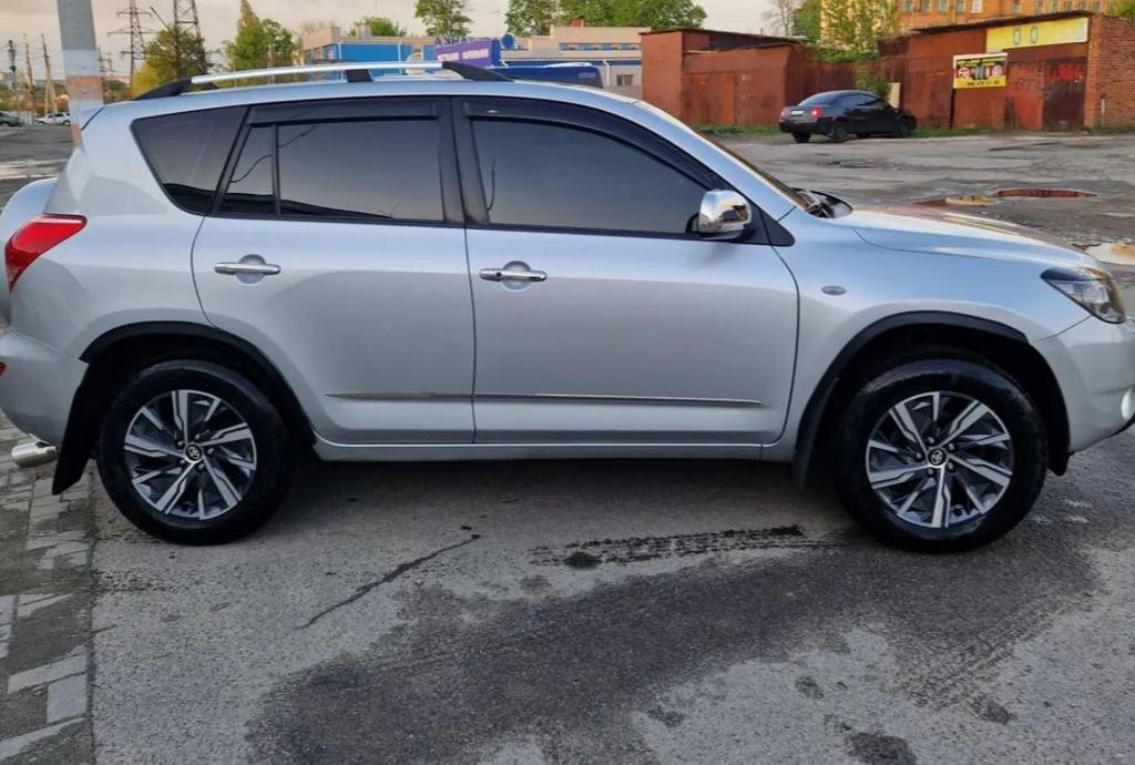 

Накладки на арки (4 шт, чорні, ABS-пластик) для Toyota Rav 4 2006-2013 рр.