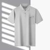 Men's Breathable Cotton Polo Shirt Casual Short Sleeve Lapel Top with Real Pocket Solid Color Daily Tee