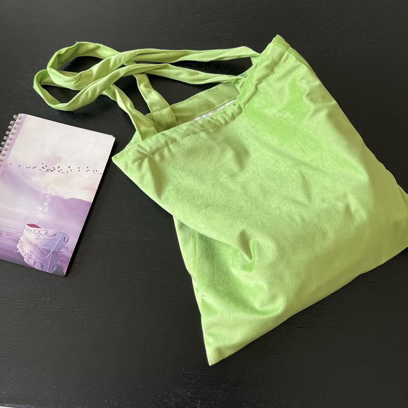 

Spring and summer new French retro green velvet fabric thin shoulder bag niche leather rope underarm bag women s backpack