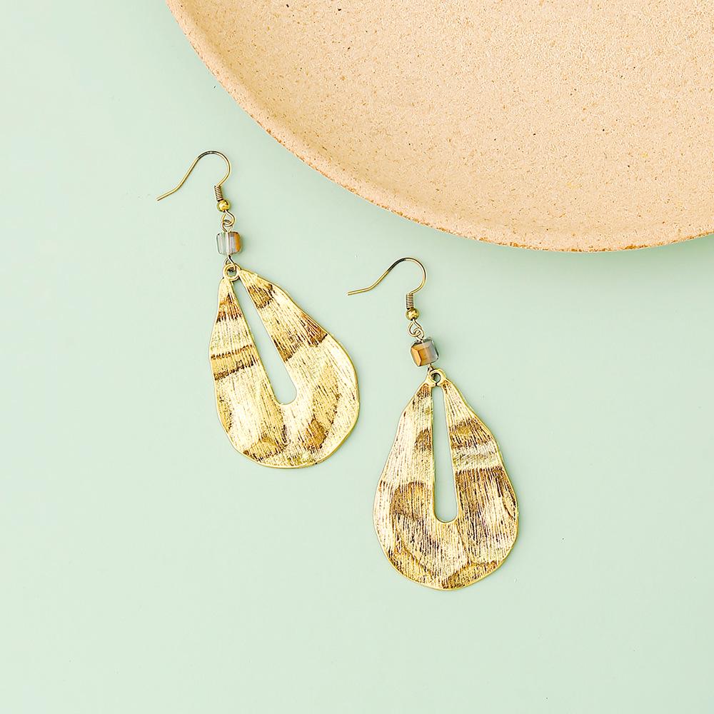 Retro Irregular Water Drop Earrings: Alloy Brushed with Unique Textured Design for Women