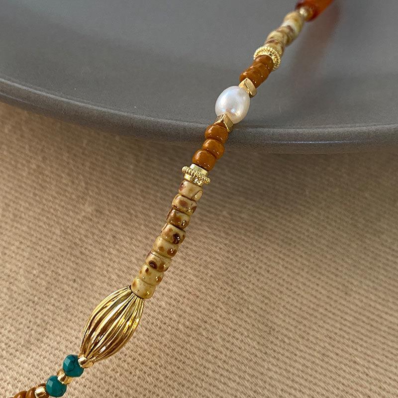 Guo Huang Roter Rhodonit Perlenkette - Naturstein Pulloverkette Schlüsselbein-Accessoires für Neujahrsfeierlichkeiten.