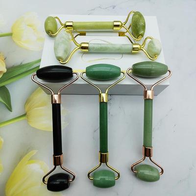 Rose Quartz Dual-Head Roller Massager for Facial and Eye Acupressure.