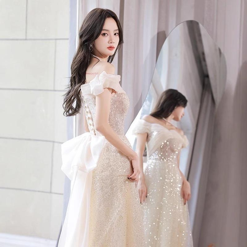 One-word shoulder evening dress skirt 1011 new temperament light luxury niche champagne color super fairy host evening dress