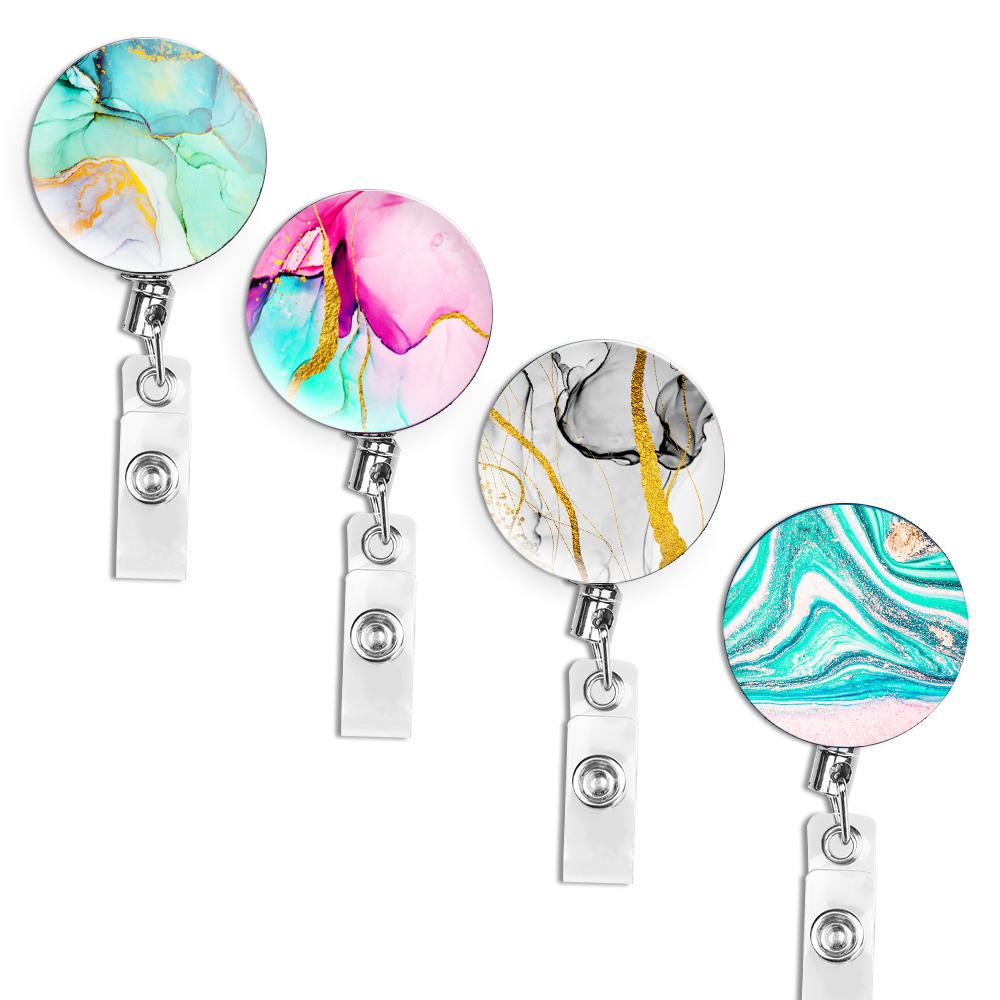 Set Creativo di Portachiavi Retrattili per Ufficio - Cavo d'Acciaio Anti-Perdita in 4 Pezzi