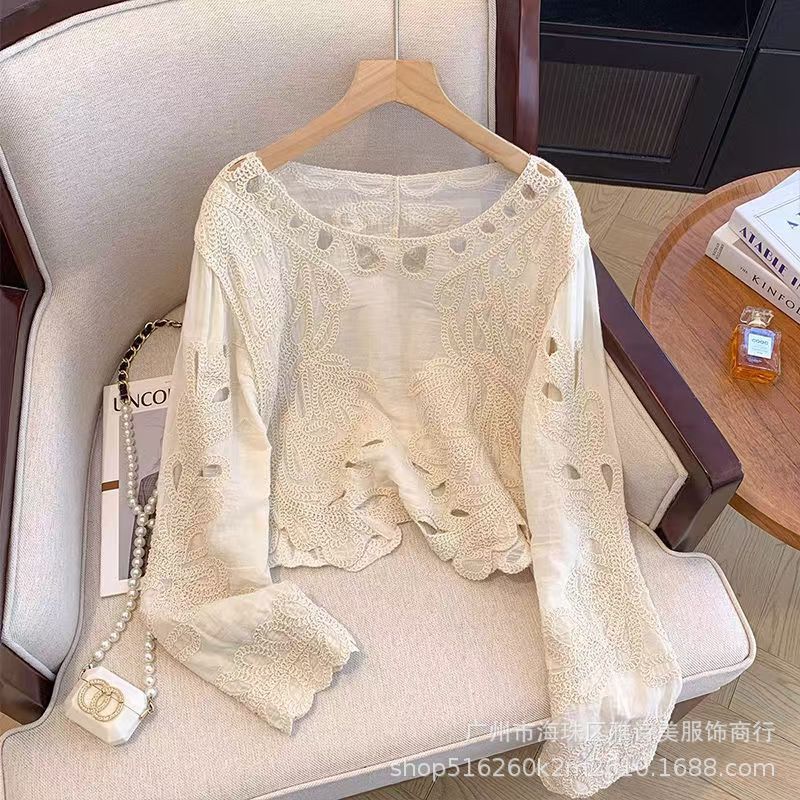 

Temperament off-the-shoulder crochet hollow long-sleeved knitted sweater women s early autumn high-end sense loose and thin versatile top tide one size fits all