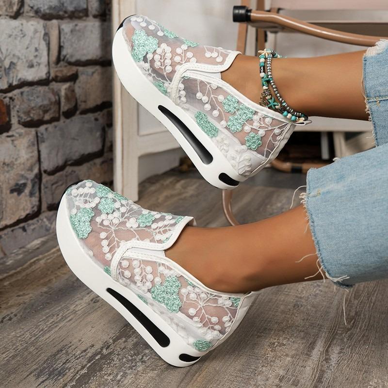 Order a size up. Women's platform wedge sneakers. Mesh floral embroidery sneakers for women. Casual comfortable slip-on heeled shoes for women.